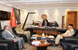 Al-Mnifi meets with Al-Haddad.