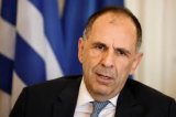 Greek newspaper: Greek Foreign Minister to visit Benghazi and Tripoli this July