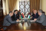 Al-Huwaij meets with the Palestinian Minister of Economy in Cairo.