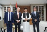 Agila meets with the Greek Ambassador.