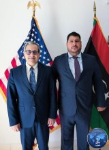 Berndt congratulates (Masoud Suleiman) on achieving production of (1.4) million barrels of oil per day