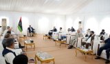 Al-Menfi discusses with a delegation of notables and elders from Souq Al-Juma, the four (…)