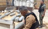Recovering War Remnants from Tripoli Zoo.